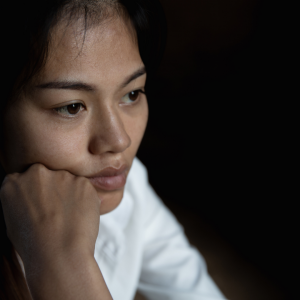 woman leaning on her hand