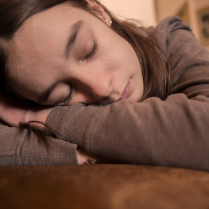 woman laying her head down